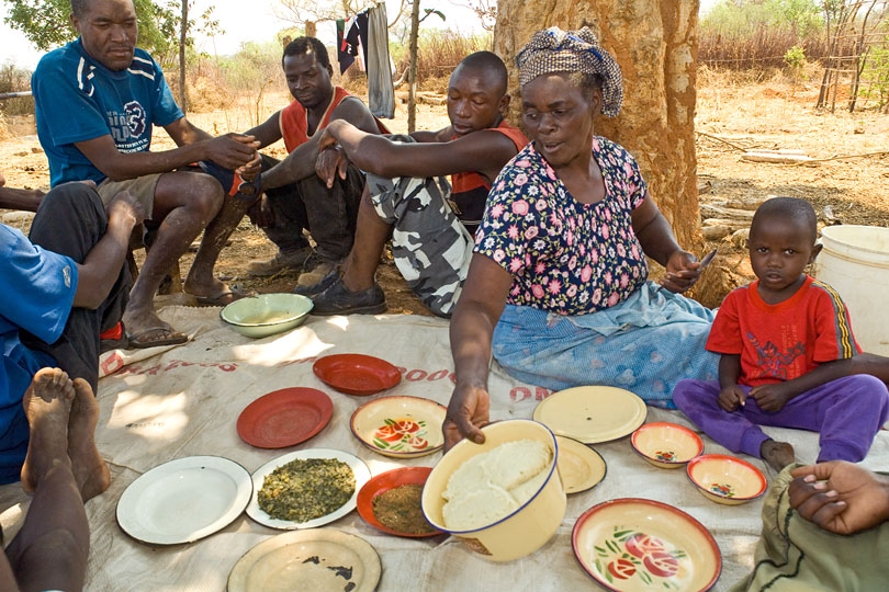 The dairy farmer’s family has lunch<p> with the workers who milk the cows