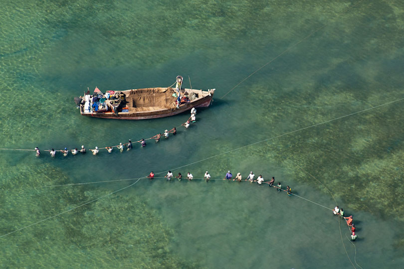 Fishermen fishing with nets, Pwani Region, Tanzania
