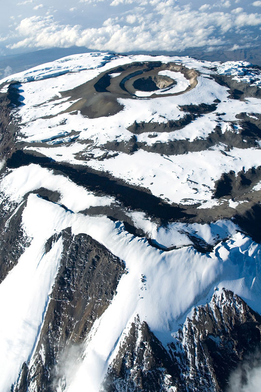 Kilimanjaro with vulcanic ash cone and pit, <p>Southern Ice field (foreground), Tanzania