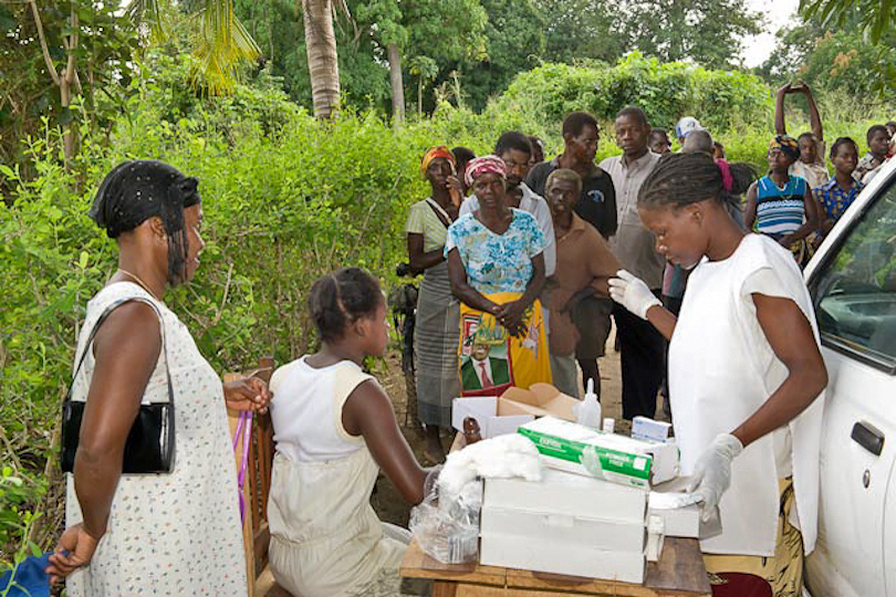 Villagers queuing for rapid HIV/AIDS testing<p> during an awareness campaign