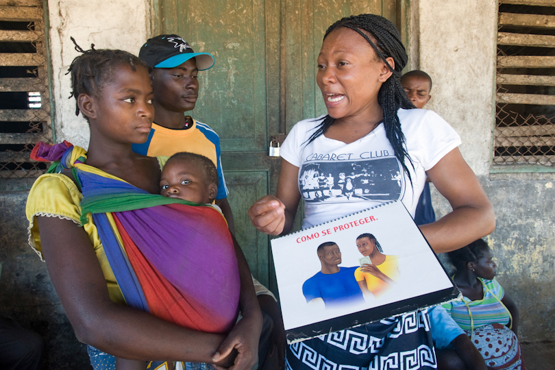 Young couple with child attends<p> a HIV-AIDS awareness campaign
