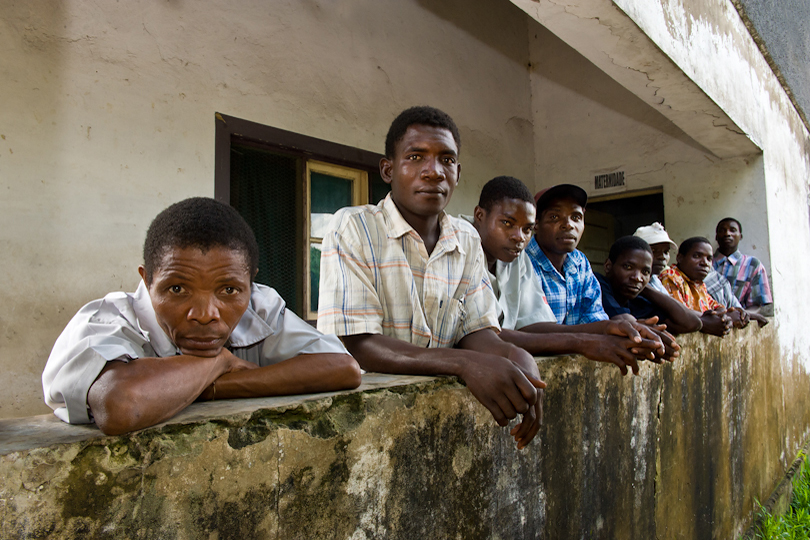Husbands waiting for their wives and children<p> outside a HIV-AIDS clinic