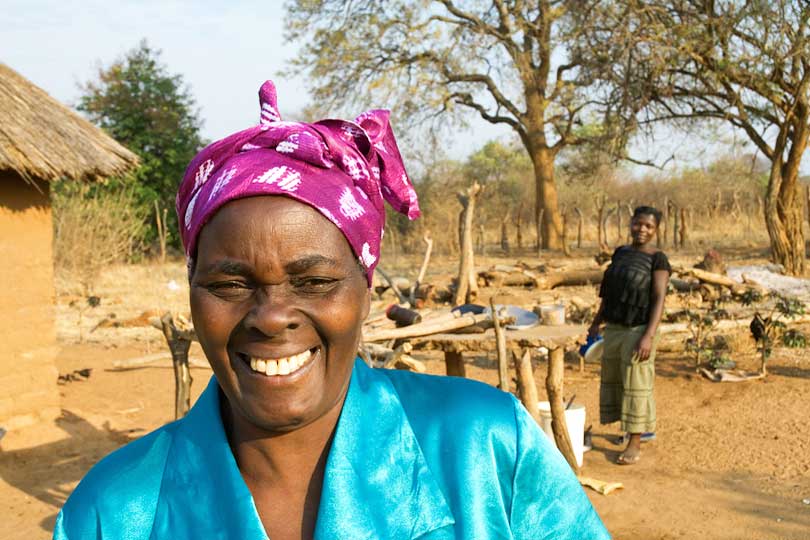 Zambian woman who is running a successful <p>smallholder dairy farm, Magoye, Zambia