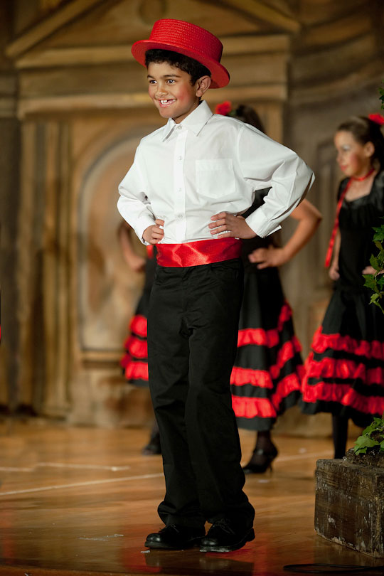 Children of St George's School performing in a dance on stage,<p> Cape Town, South Africa